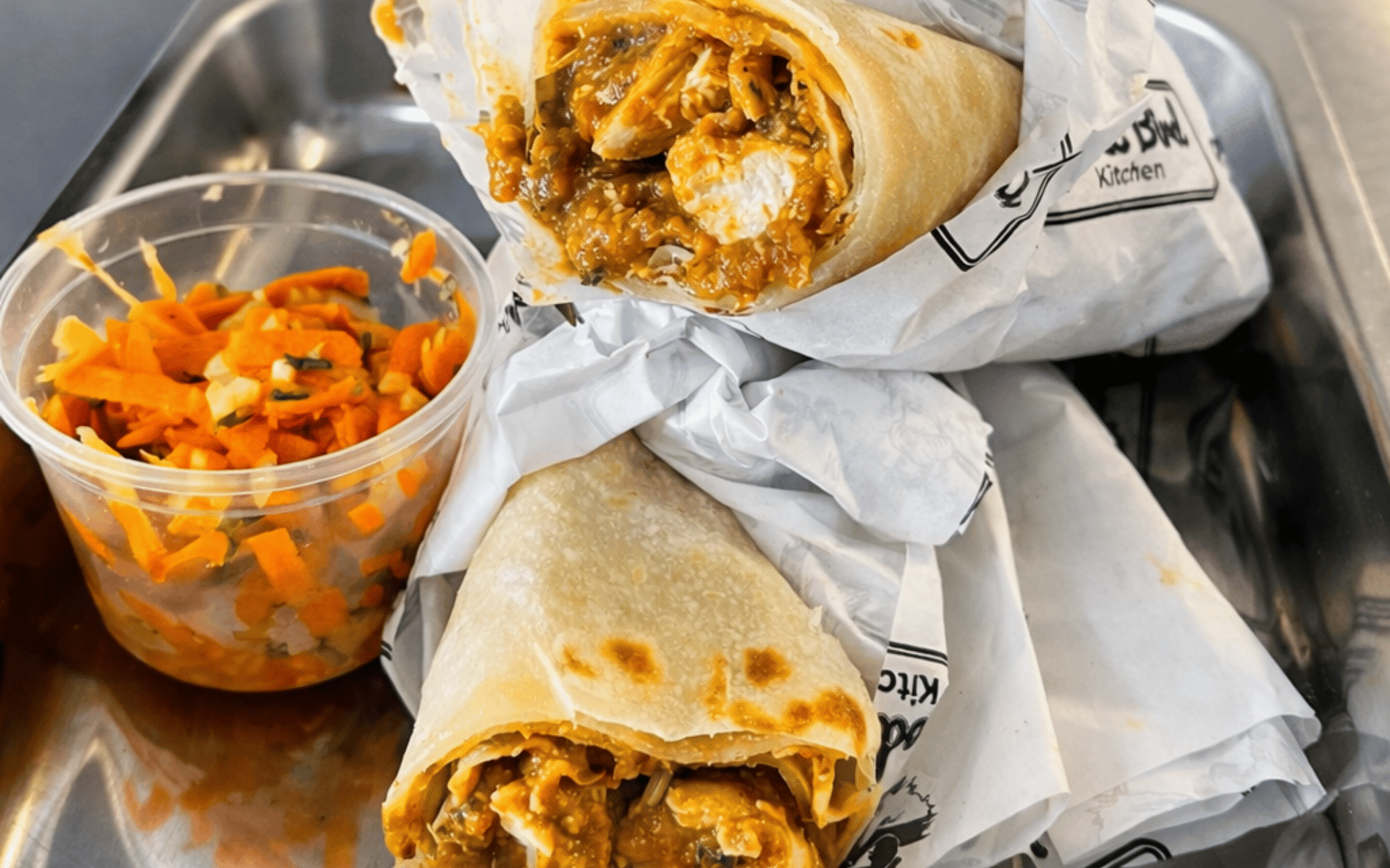 Chicken curry roti from Good Bird Kitchen served with carrot salad in Gordon’s Bay