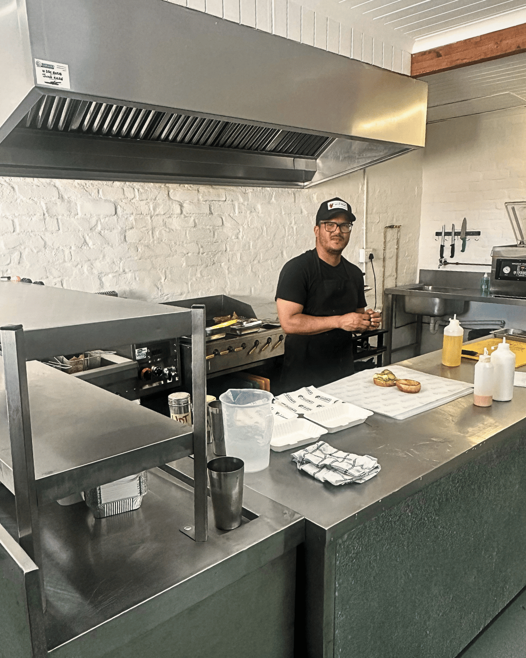 Michael Daniels in the Good Bird Kitchen workspace during the early build of the brand